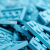 A pile of blue Leggos, they are both functional and aesthetically pleasing.